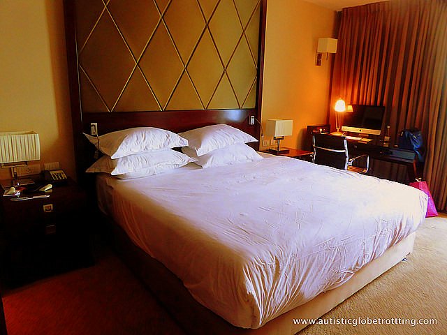 Family Fun at the Crowne Plaza Tel Aviv Beach Hotel bed