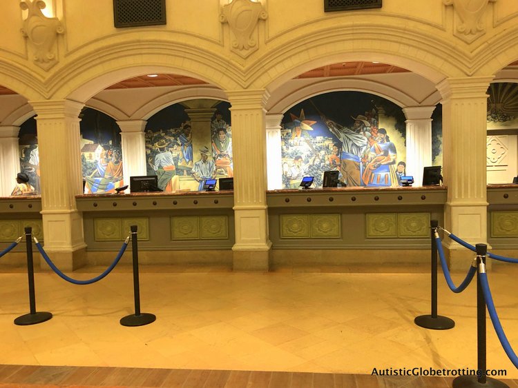 Disney Coronado Springs Resort Tips for Families murals behind the check in