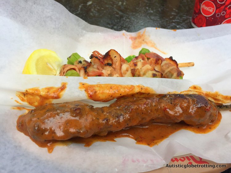 Ten Must Try Disneyland Snacks skewers with sauce