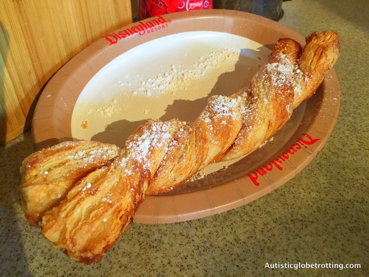 Ten Must Try Disneyland Snacks churro on plate