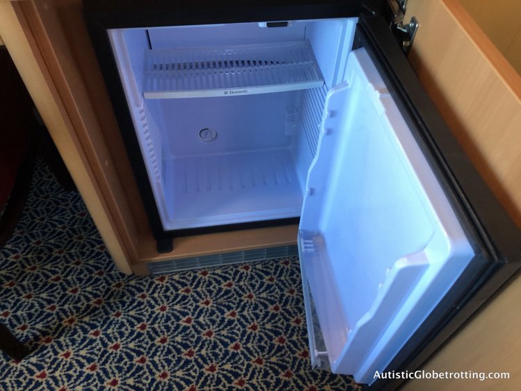 Is a Disney Dream Deluxe Family Oceanview Stateroom worth the splurge? fridge in cabin