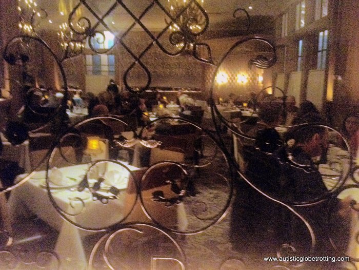 Dining at Commander’s Palace Restaurant in New Orleans window