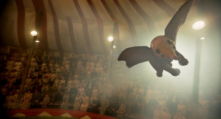 Tim Burton's Dumbo Soars Captivating Audiences of all Ages  flying