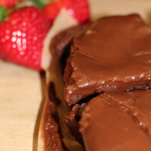 gluten and dairy free brownies topped with dairy free chocolate brownie icing