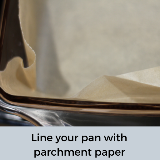 glass baking dish lined with parchment paper