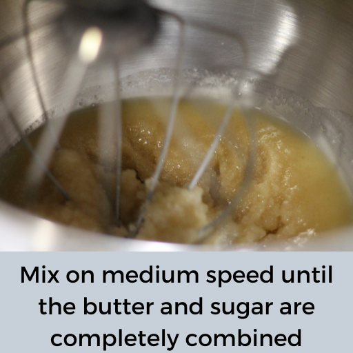 butter and sugar mixed together in a mixing bowl